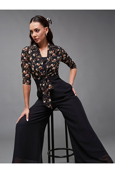 Styli Floral Print Round Neck Wide Leg Jumpsuit with Tie-Up Detail