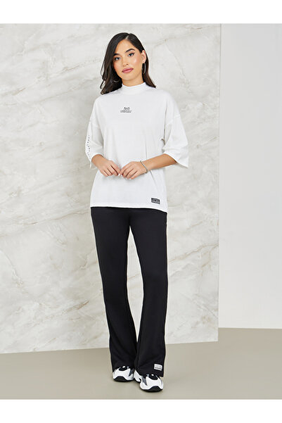 Styli Printed High Neck Drop Shoulder T-shirt and Flared Co-ords