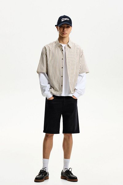 Bershka Denim Bermuda shorts with turn-up hems