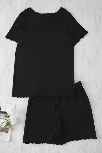 Trendyol Curve Schwarzes, detailliertes, geripptes, gestricktes Baby-Overlock-Pyjama-Set TBBSS25AI00040