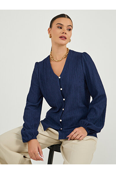 Styli بلوزة ذات أكمام منفوخة ورقبة على شكل حرف V