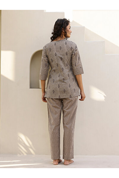 Sanskrutihomes By Styli All-Over Print Wrap Top with Striped Trousers Co-Ords