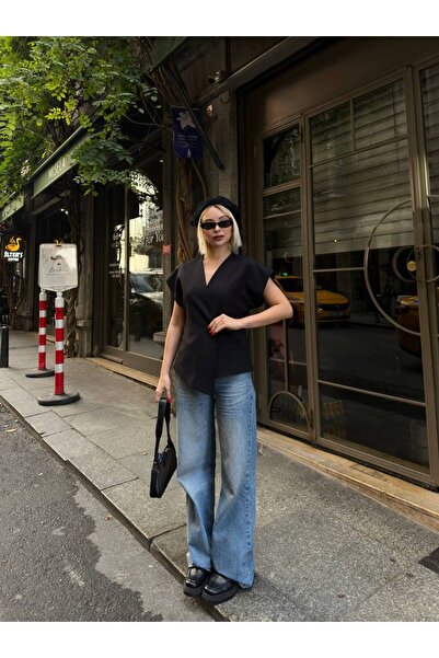 buqre's moda Vestă asimetrică cu detaliu cu nasturi aurii