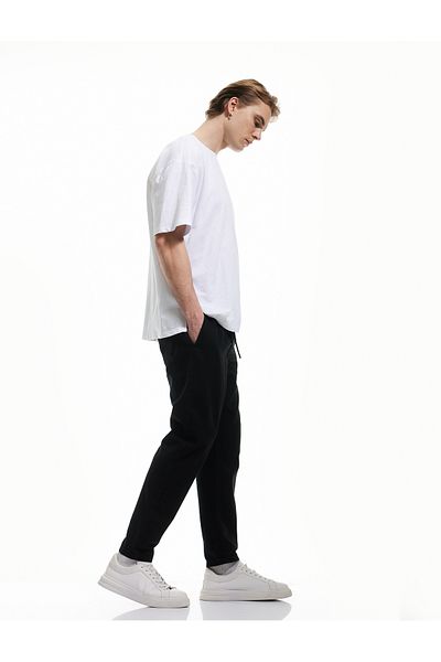 Koton Lockere Jeanshose mit Schnürung und Taschen an der Taille