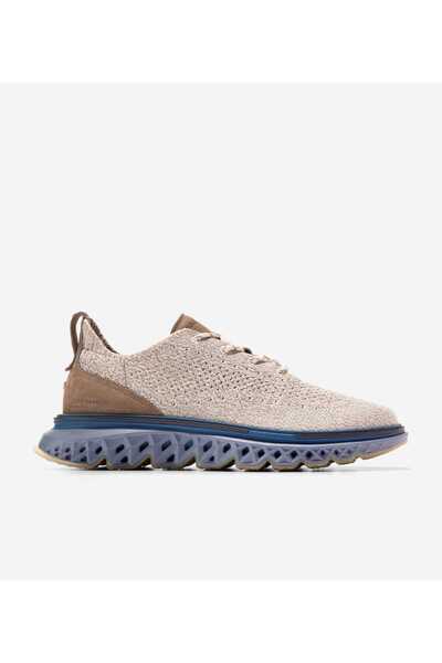Cole Haan 5. حذاء أوكسفورد Zerogrand Stitchlite Wingtip للرجال باللون البيج