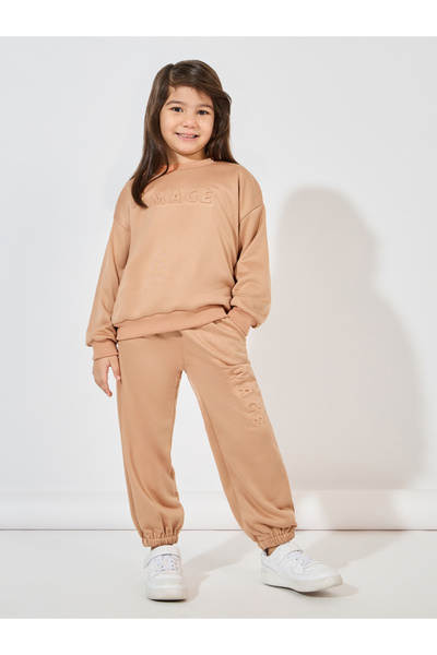 Styli Embossed Print Drop Shoulder Sweatshirt & Jogger Set