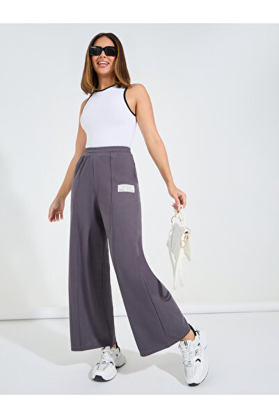 Styli High Waisted Wide Leg Pintuck Jogger with Badge Detail
