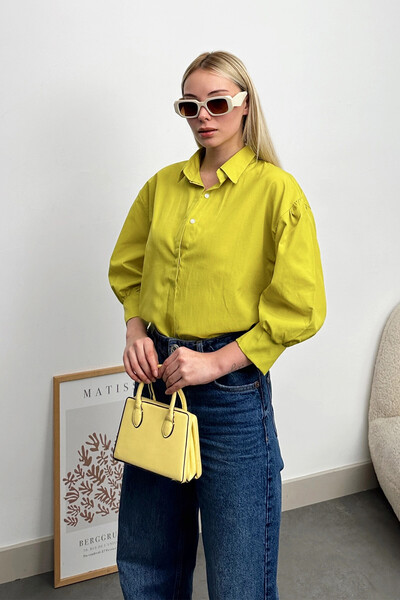 VAGGON Női olajzöld léggömb ujjú, rejtett póló