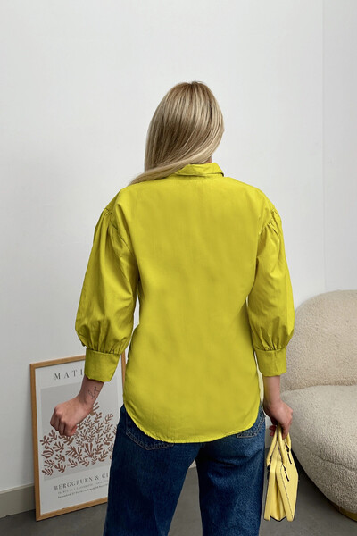 VAGGON Női olajzöld léggömb ujjú, rejtett póló