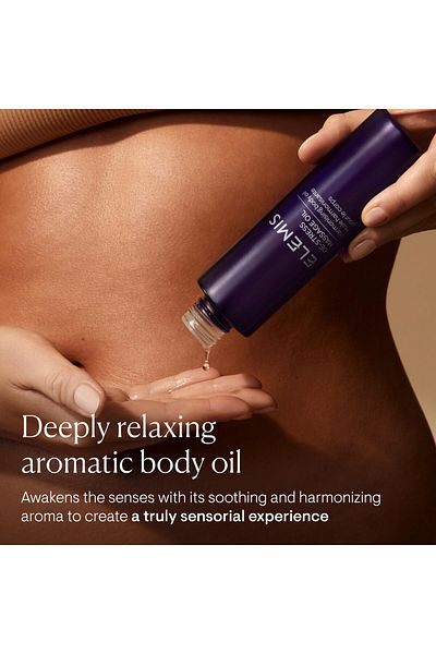 Elemis زيت تدليك سريع الامتصاص مع الزيوت الأساسية، يهدئ العضلات ويرطب البشرة
