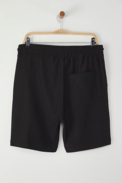 Kolekcia Trendyol Flexibilná zavinutá tkanina – čierne šortky Regular Fit a Bermudy TMNSS25SR00006