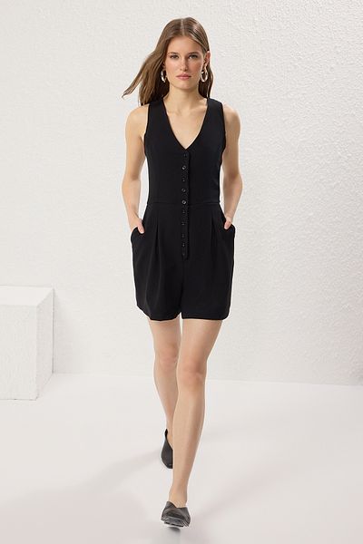 Trendyol Collection Schwarzer, geknöpfter Mini-Jumpsuit mit weitem Bein TWOSS25TU00011