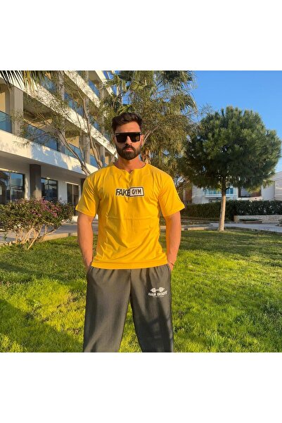 Bas Body FitnessWear Tricou oversize cu decolteu în V și imprimeu FakeGYM