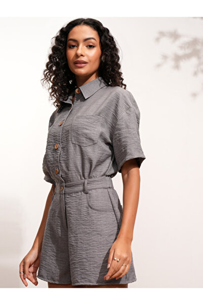 Tokyo Talkies By Styli Textured Collared Jumpsuit with Button Detail