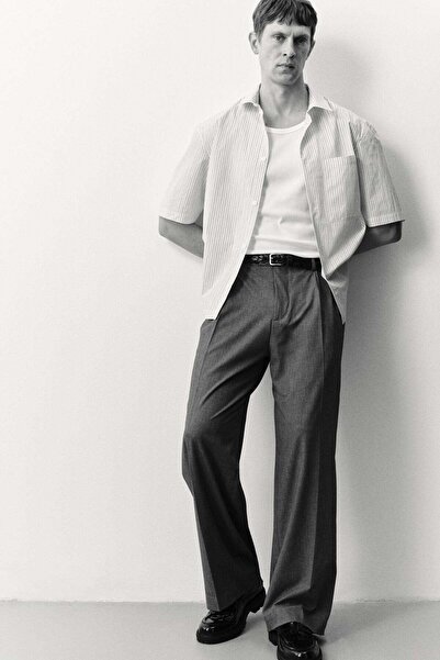 H&M بنطلون فضفاض مُفصل