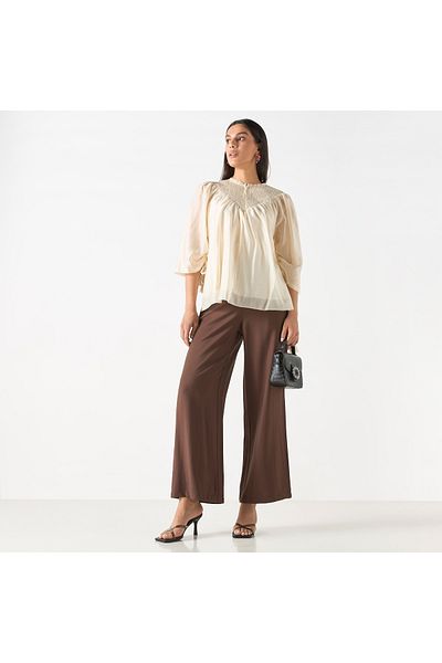 Iconic 3/4 Sleeve Top With Smocked And Tassel Detail