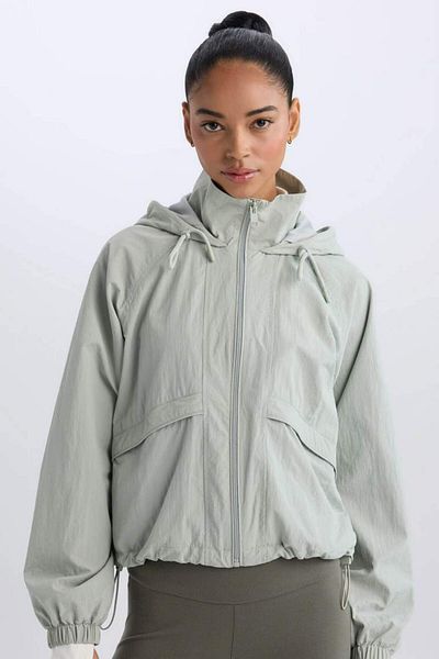 DeFacto New Season Water Repellent Fabric Thin Raincoat with Hood and Zipper Pockets