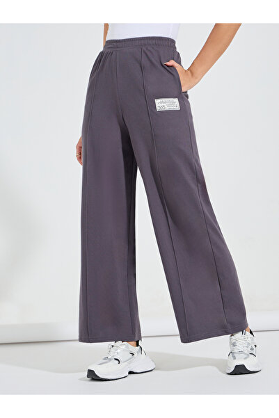 Styli High Waisted Wide Leg Pintuck Jogger with Badge Detail