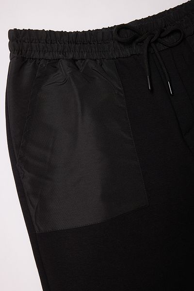 Trendyol Collection Μαύρο ύφασμα αλεξίπτωτου - Χοντρό σορτς & βερμούδες με λεπτομέρεια τσέπης TMNSS25SR00028