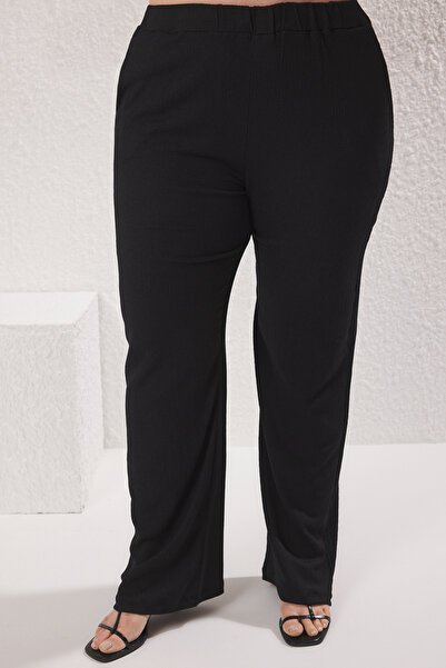 Trendyol Curve Mărime mare tricotată flexibilă - Costum negru înfășurat cu volantă TBBSS25CP00017