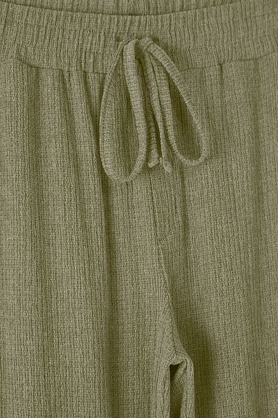 Trendyol Collection Mintfarbene, strukturierte Jogginghose mit weitem Bein und offenem Bein