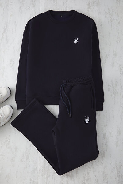 Trendyol Collection Σετ αθλητικής φόρμας πλεκτό με κέντημα ελαφιού σε μπλε ναυτικό oversized / φαρδιά εφαρμογή TEDAW25EM00006