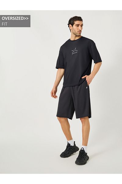 Styli Oversized Slogan Print Round Neck T-Shirt and Shorts Set