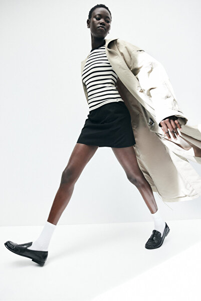 H&M Bedene Oturan Tişört