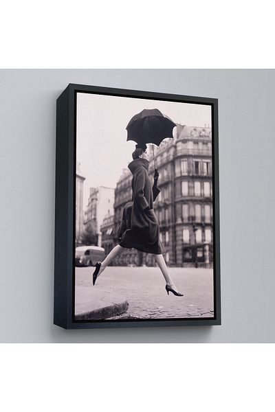 Harita Sepeti Carmen Jumping over a Puddle of Water on the Street with Umbrella in Black Frame Canvas Print