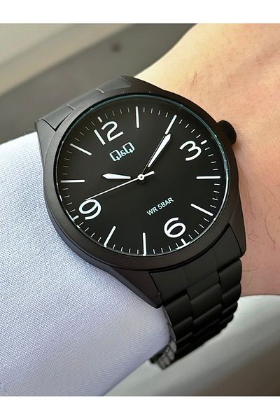 Q&Q Men's Black Metallic Striped Cord Wrist Watch