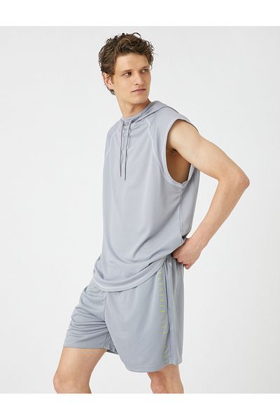 Koton Pantaloni scurți sport cu dantelă în talie cu detaliu de buzunar imprimat cu dungi