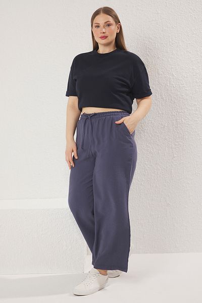 Trendyol Curve Anthrazitfarbene, gewebte Hose mit weitem Bein und elastischem Bund in Übergröße TBBSS25AR00034