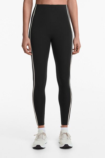 Oysho Compressive raise up ankle-length leggings with piping