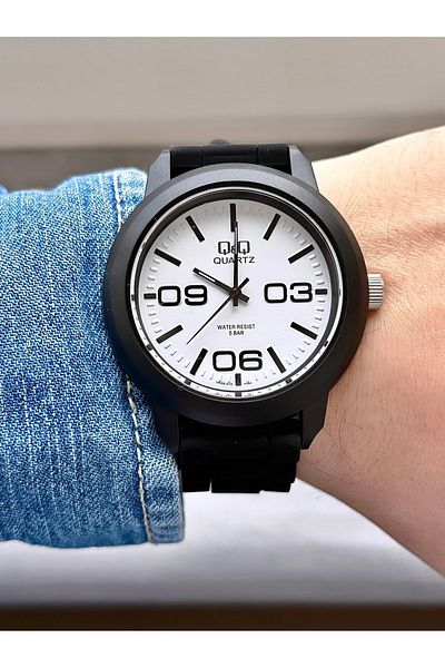 Q&Q Women's Waterproof Plastic Cord Wristwatch