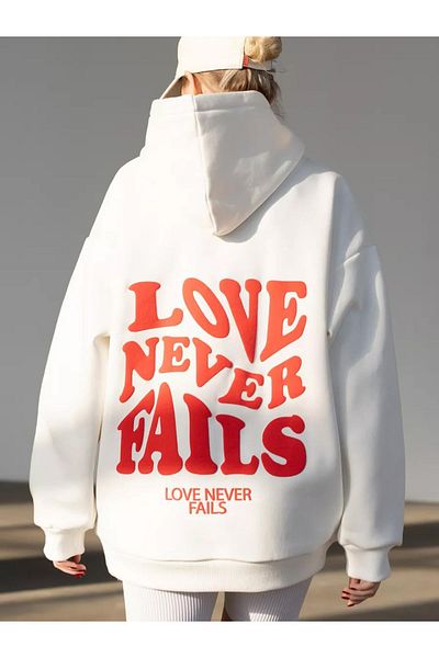 Cupla White Unisex "Love Never Fails" Sweatshirt