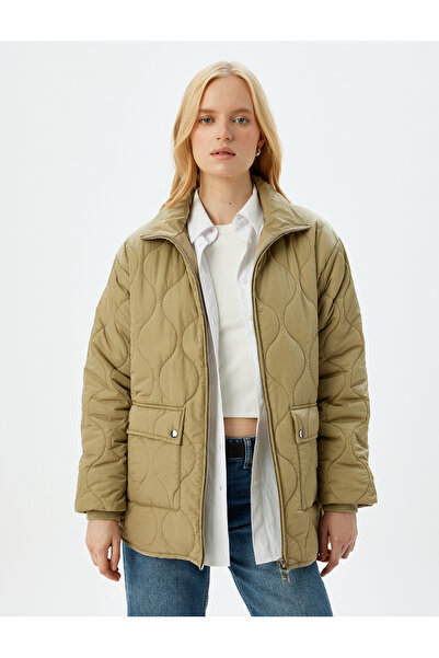 Koton Καπιτονέ φουσκωτό παλτό με όρθιο γιακά με τσέπες με φερμουάρ