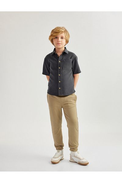 Koton Basic Trousers Look Jogger Sweatpants με λεπτομέρεια τσέπης και δέσιμο στη μέση