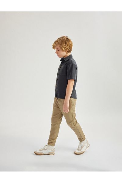 Koton Basic Trousers Look Jogger Sweatpants με λεπτομέρεια τσέπης και δέσιμο στη μέση