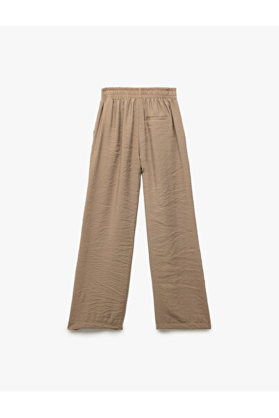 Koton Modal Kumaş Düğmeli Yan Cepli Düz Bol Paça Pantolon