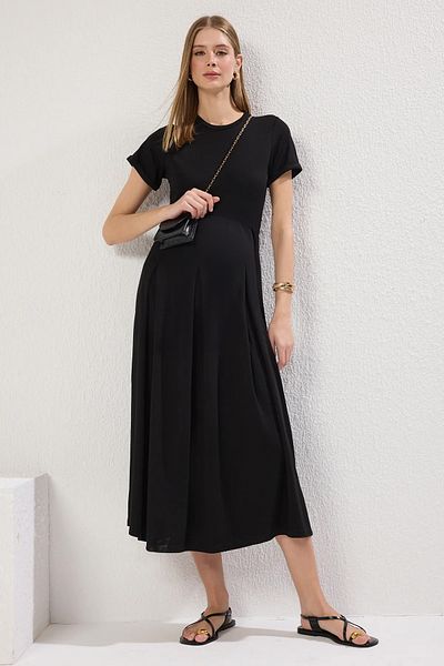 Trendyol Collection Czarna sukienka dzianinowa maxi z linią/rozcięciem dzwonkowym Twoss25El00073