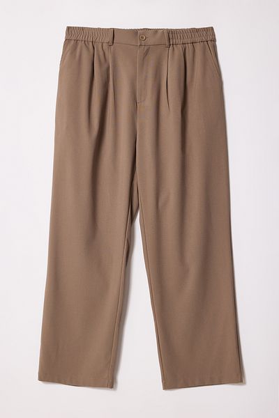 Trendyol Collection Beigefarbene, lockere Wideleg-Stoffhose in Übergröße TMNAW25AR00000