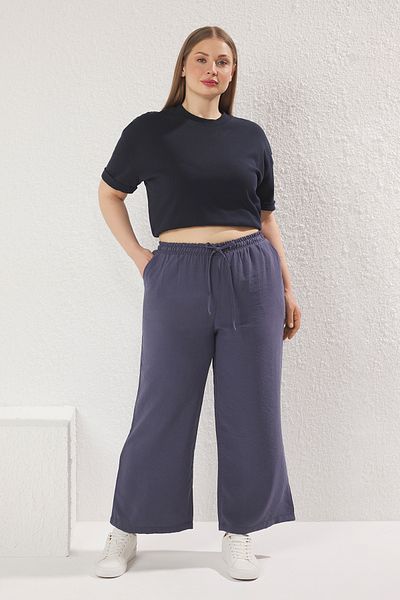 Trendyol Curve Anthrazitfarbene, gewebte Hose mit weitem Bein und elastischem Bund in Übergröße TBBSS25AR00034