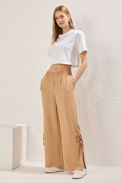 Trendyol Collection Light Brown Aerobin Leg Slit Bow Detailed Wide Leg Pants Twoss25Pl00089