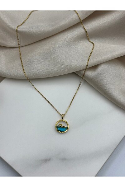 Lumiera قلادة من الفولاذ الذهبي مع تفاصيل الحوت العائم في الماء الأزرق