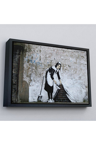 Harita Sepeti Crna slika na platnu u crnom okviru, prikazuje čistačicu koja č...