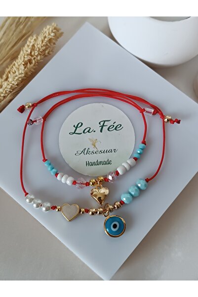 La fee aksesuar مجموعة من سوار وخلخال مكونة من 2 خرزة عين الشر - حبل أحمر على شكل قلب - الحظ