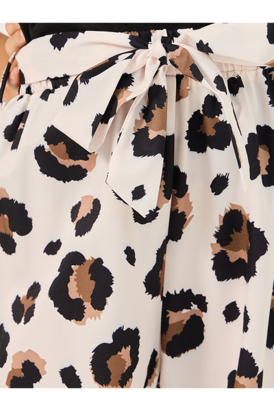 Styli Solid T-Shirt and Animal Print Pants Set