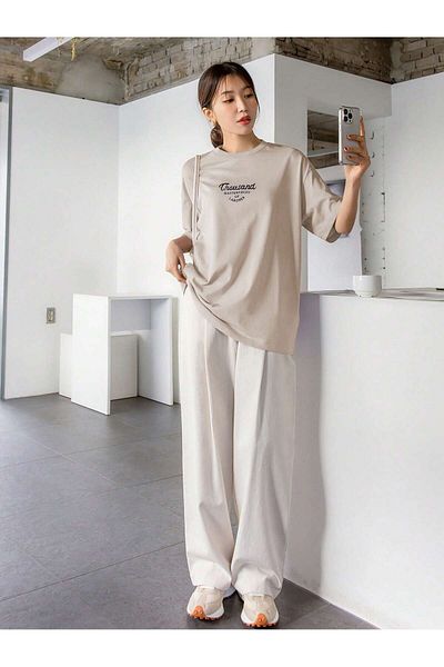 uyguntarz Unisex-T-Shirt mit „Thousand“-Aufdruck