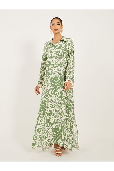 Styli printed soft fabric jalabiya in collar style w/ tassel and shell trim at sleeve hem