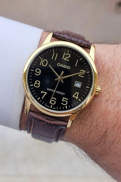 Casio Men's Wristwatch with Yellow Cord and Brown Color Guaranteed Calendar